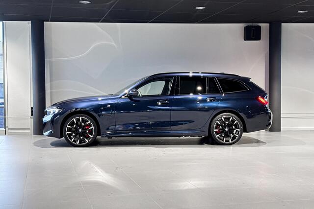 BMW 3-SERIE Touring 330e | M Sport Pro | Glazen Panoramadak | Harman Kardon | Trekhaak |