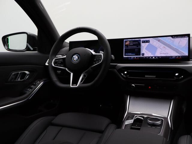 BMW 3-SERIE Touring 330e M Sportpakket | Comfort Pack | Stuurwielrand Verwarmd | Comfort Access | Trekhaak | DAB | HiFi | 19''