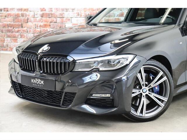 BMW 3-SERIE Touring 330i xDrive High Executive M Sport / Panoramadak / Head-Up Display / Trekhaak / Leder / Apple CarPlay / Harman Kardon / 19 Inch / Laserlicht / M Sportremsysteem / Adaptief M-onderstel