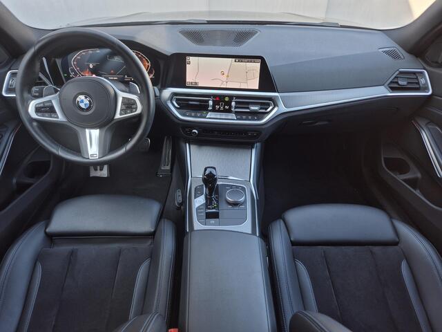 BMW 3-SERIE 320i Business Edition M Sport Automaat / Dealer onderhouden / Stoelverwarming / Trekgewicht 1600 kg / Apple Carplay Android Auto / Cruise control / Keyless Entry/Start / Climate control / Parkeersensoren voor en achter /