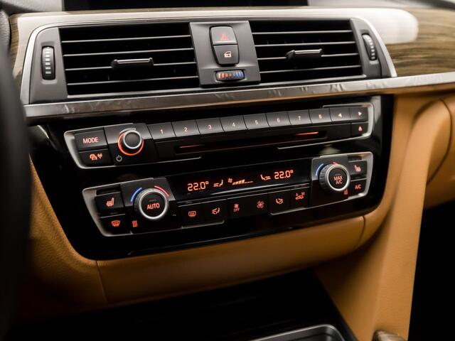 BMW 3-SERIE 318i Luxury Sport Automaat (VIRTUAL COCKPIT, GROOT NAVI, COGNAC LEDER, STOELVERWARMING, PARKEERSENSOREN, ELEK ACHTERKLEP, GETINT GLAS, NIEUWE APK, NIEUWSTAAT)