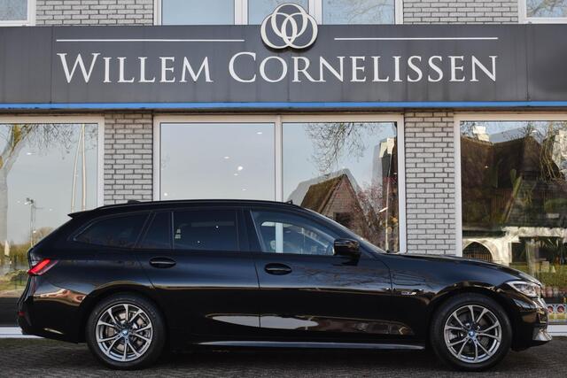 BMW 3-SERIE Touring 320e Panoramadak ACC Trekhaak Stuur/Stoelverwarmin