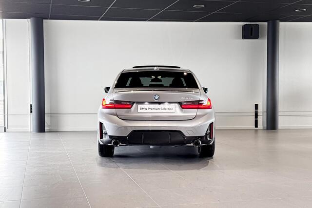 BMW 3-SERIE Sedan 330e | M Sport Pro | Glazen schuif-/kanteldak | Stoelverwarming | Comfort Access |
