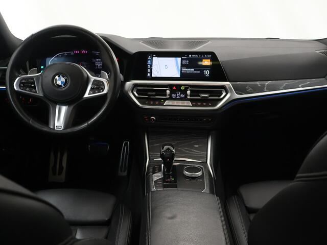 BMW 3-SERIE Touring 330e | M-Pakket | Shadow Line | LED | Panoramadak | Sportstoelen | Stoelverwarming V+ A | 360 Camera | DAB | Adaptieve Cruise Control | Sfeerverlichting | Harman/Kardon | Ele. kofferdeksel |