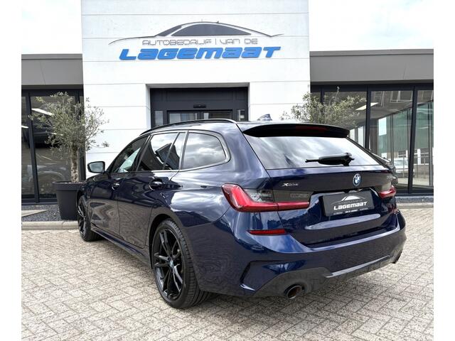 BMW 3-SERIE touring 330e xDrive M Sport | PANO | HUD | TREKHAAK | ELEC. STOELEN | LA