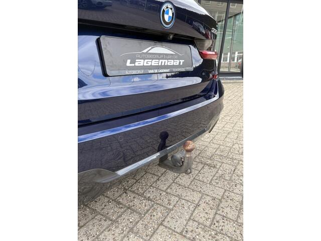 BMW 3-SERIE touring 330e xDrive M Sport | PANO | HUD | TREKHAAK | ELEC. STOELEN | LA