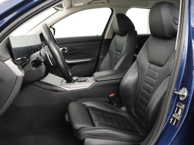 BMW 3-SERIE 318i | Leder | Adaptive cruise | Stoelverwarming | Memory | Live Cockpit | Sportstoelen | Carplay | Keyless | Trekhaak | Parkeerhulp | Climate control | Full LED | Origineel NL