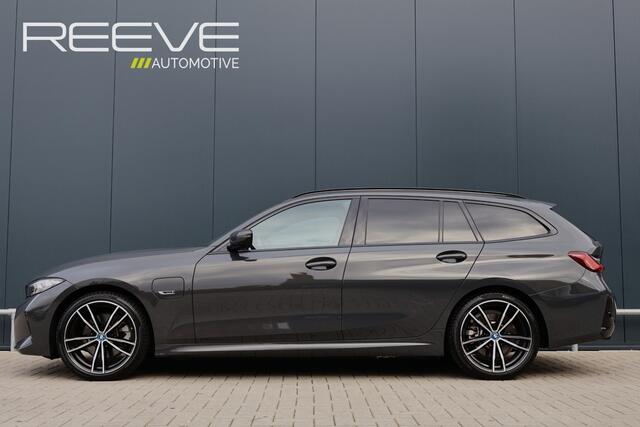 BMW 3-SERIE Touring 320e | M Sport LCI | Dravitgrau | Leer / Alcantara | Trekhaak afn. | 19 Inch | Stoelverwarming | Live Cockpit Plus | M-Pakket