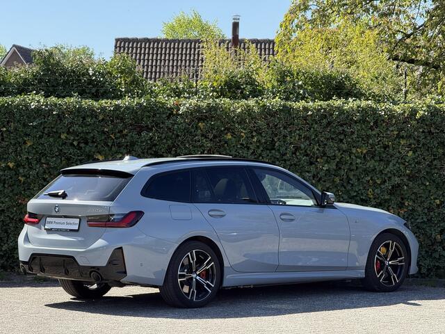 BMW 3-SERIE Touring 330e | M-Sport Pro | Panorama | Camera | Getint Glas | HiFi