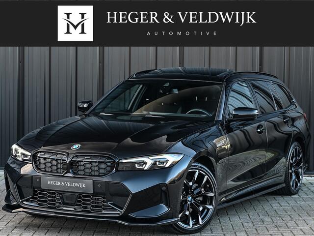 BMW 3-SERIE Touring 330e xDrive M sport | Accu 19,5kWh | Trekhaak | Panorama dak | Active Cruise | Camera | Ambiance interieur