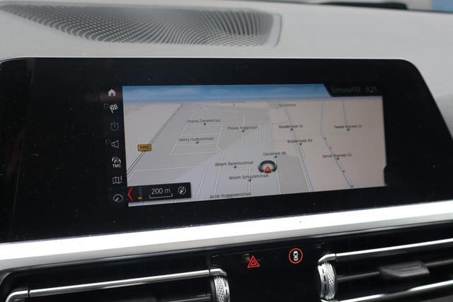 BMW 3-SERIE Touring 320d | Panoramadak | Elek trekhaak | Stoelverwarming | Cruise control