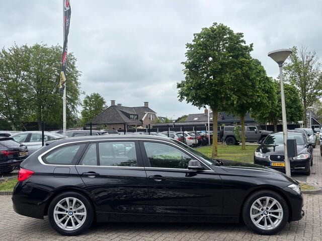 BMW 3-SERIE Touring 320i High Executive Automaat 2017 Zwart Leder
