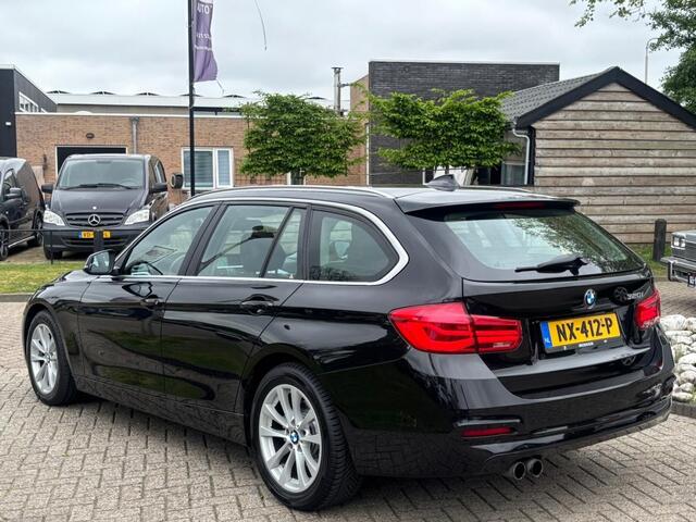 BMW 3-SERIE Touring 320i High Executive Automaat 2017 Zwart Leder