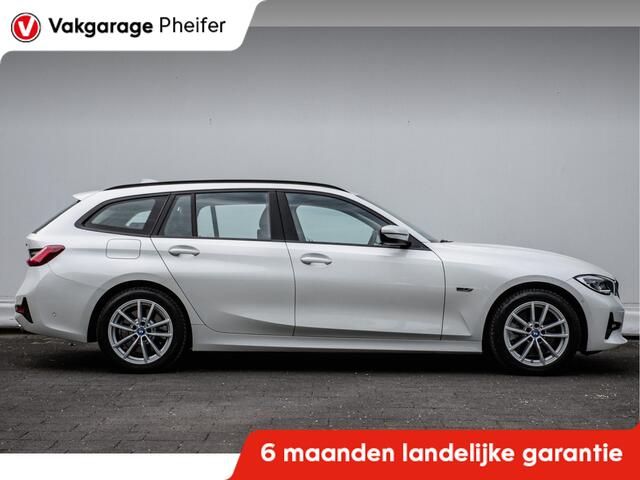 BMW 3-SERIE Touring 320e Business Edition Plus Trekhaak/ Leer/ Stoelverwarming/ Camera/ Laserlight