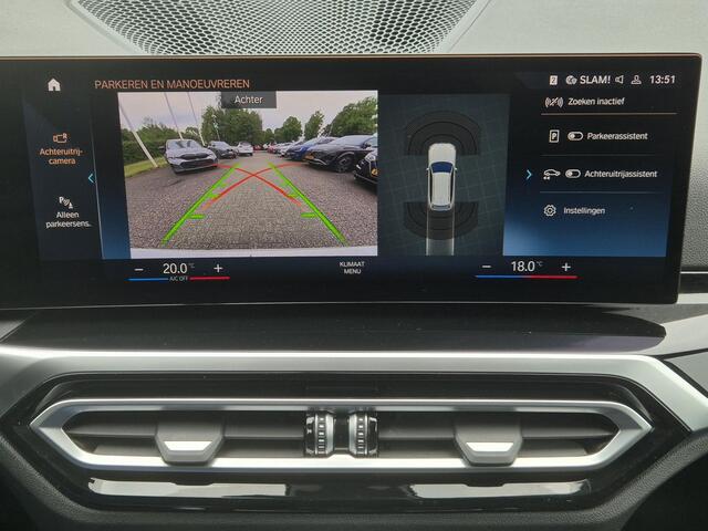 BMW 3-SERIE Touring 320e xDrive / Trekgewicht 1.500 kg / Dealer onderhouden / Elektrische achterklep / Glazen schuif- en kanteldak / Head Up Display / Stoelverwarming / Achteruitrijcamera / Adaptief cruise control / Apple Carplay Android Auto / Keyless Entry/Start /