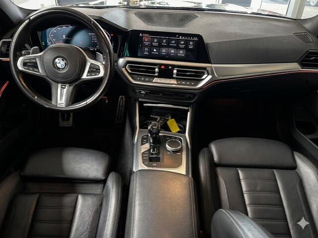 BMW 3-SERIE 320i Business Edition Plus Kanteldak, Head-up Display, Carplay, Android Auto, M pakket
