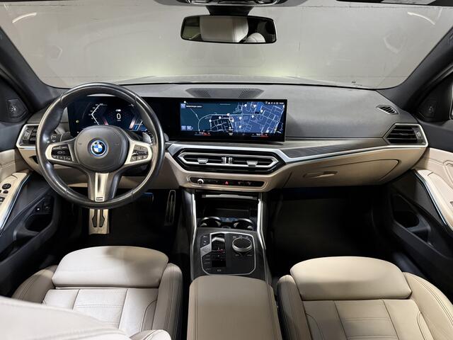 BMW 3-SERIE Touring 330e | M-pakket | Lederen sportstoelen | Harman/Kardon | Sfeerverlichting | Full LED