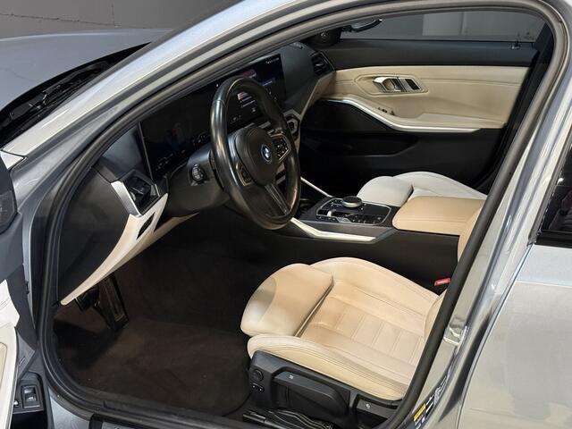 BMW 3-SERIE Touring 330e | M-pakket | Lederen sportstoelen | Harman/Kardon | Sfeerverlichting | Full LED
