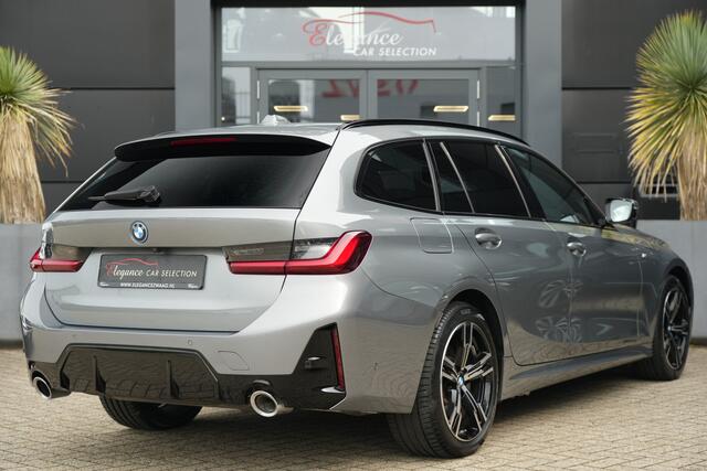 BMW 3-SERIE Touring 330e M Sport High Executive 292pk Navigatie/HUD/360Camera