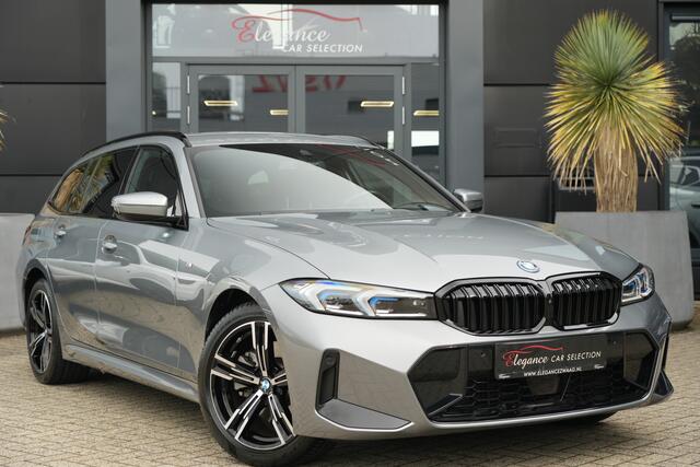 BMW 3-SERIE Touring 330e M Sport High Executive 292pk Navigatie/HUD/360Camera
