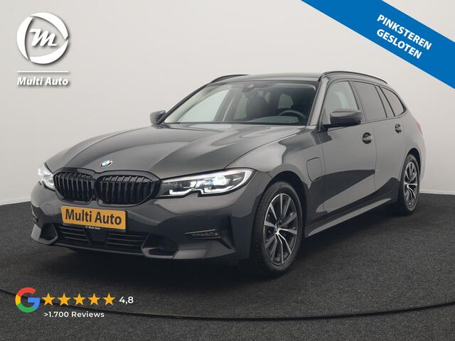 BMW 3-SERIE Touring 330e Sport Line PHEV 293pk Dealer O.H. DRAVITGRAU | Trekhaak Af Fabriek | Adaptive Cruise | 360 Camera | Lederen Sportstoelen Memory & Verwarmd | Sfeerverlichting | Stuur Verwarmd | Apple Carplay | Navigatie | DAB | Plug In Hybrid |