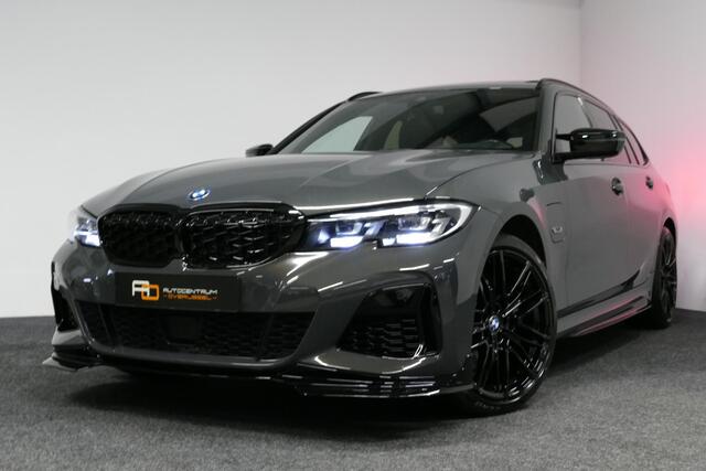 BMW 3-SERIE Touring 320e xDrive M Sport / M340i Diffuser / Black Diamond M Grille / M340i M Sport bumper pakket / Schuif-/kanteldak / Elektr. verstelbare voorstoelen (links met memory) / Stoelverwarming / Apple Carplay - Android Auto / Achteruitrijcamera / Ambienteve