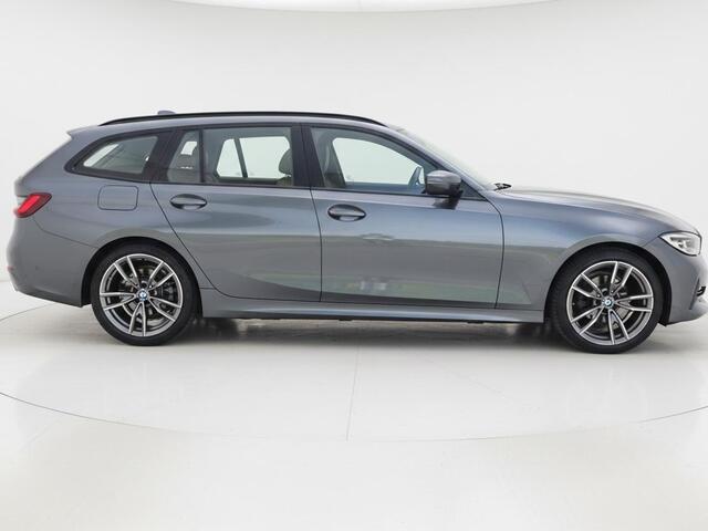 BMW 3-SERIE Touring 318i Business Edition Plus | Clima | Cruise | Multimedia/Navi | Stoel/-Stuurverwarming | Leder | PDC |