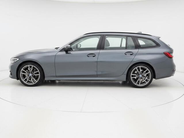 BMW 3-SERIE Touring 318i Business Edition Plus | Clima | Cruise | Multimedia/Navi | Stoel/-Stuurverwarming | Leder | PDC |