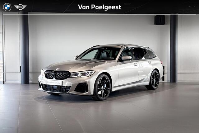 BMW 3-SERIE Touring M340i xDrive | Glazen Panoramadak | Harman Kardon | Stoelverwarming | Head-Up Display | Trekhaak |