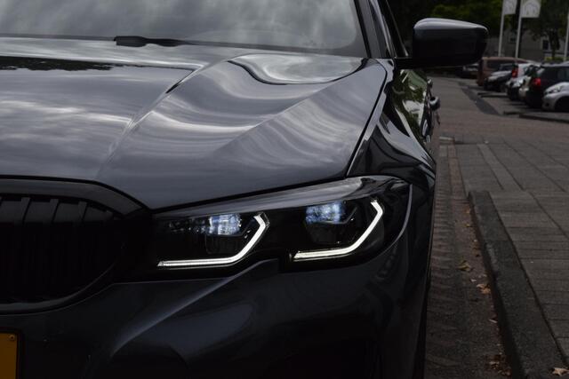 BMW 3-SERIE 320e M-pakket|Laser|19"|Dak|ACC|Cam|Trekhaak