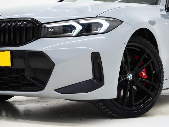 BMW 3-SERIE Touring 320i M Sport Pro Brooklyn Grey | M-sportstoelen | Panoramadak | Harman/Kardon | Carbon | Camera | Memory | Sfeerlicht