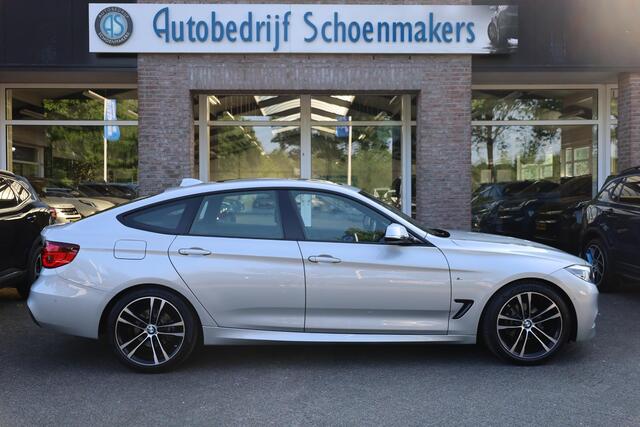 BMW 3-SERIE GT Gran Turismo 320i High Executive Edition M-Sport PANO STOELVERW. CAMERA LEER ELEC-KLEP DAB NAVI CRUISE CLIMA 2XPDC 19''LMV NAP