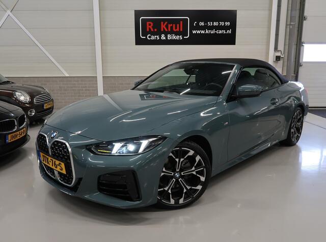 BMW 4-SERIE Cabrio 420i High Executive M-Sport Sportstoelen Camera Stoelverwarming Curved dashboard Navigatie Airco-ecc 19 inch Sportvelgen App connect Cape York Green metallic Zwart sportleer