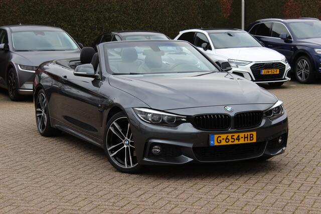 BMW 4-SERIE Cabrio 420i High Executive Ed. M Sport / Camera / Leder / Harman Kardon / Nekverwarming / 19'' / Navigatie / Windscherm / DAB / Stoelverwarming / Cruise Control