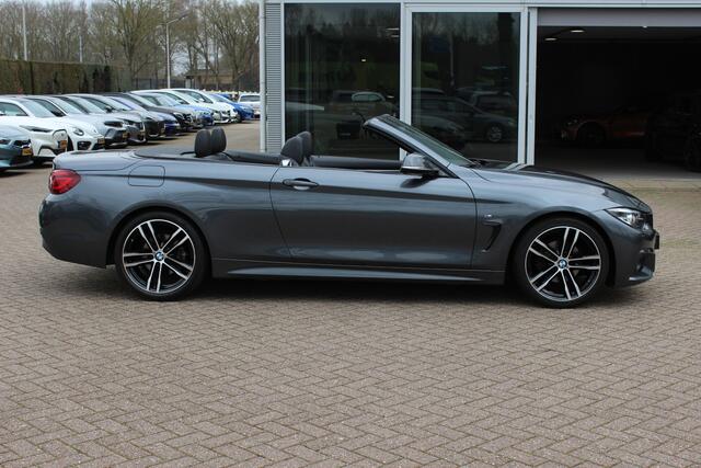 BMW 4-SERIE Cabrio 420i High Executive Ed. M Sport / Camera / Leder / Harman Kardon / Nekverwarming / 19'' / Navigatie / Windscherm / DAB / Stoelverwarming / Cruise Control
