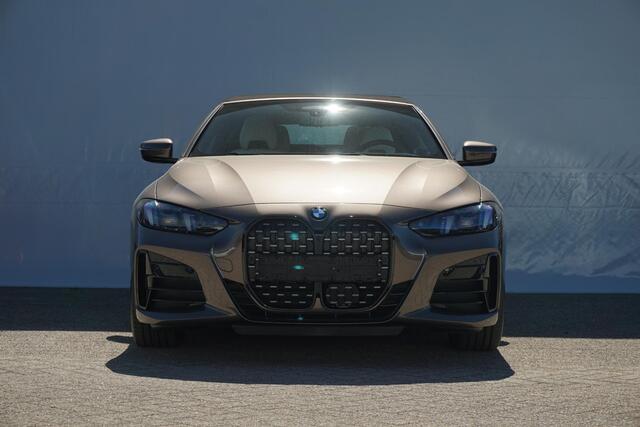 BMW 4-SERIE Cabrio 420i | M Sport Pro | Trekhaak | Head-up | Harman Kardon | Adaptief M onderstel | Comfort Access | Nekverwarming