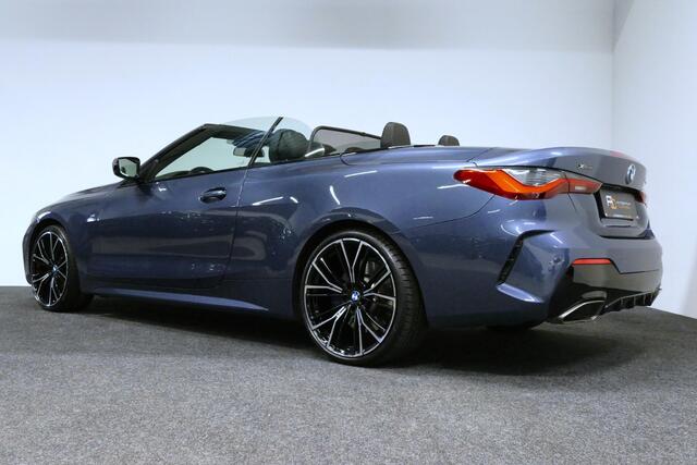 BMW 4-SERIE Cabrio M440i xDrive High Executive / Air Collar (nekverwarming / BMW Laserlight / Elektr. verstelbare voorstoelen (links met memory) / Harman Kardon Surround Sound / Stoelverwarming / 20" / Rondomzichtcamera / HUD / Apple Carplay - Android Auto / Adaptief