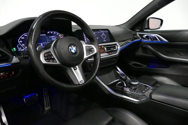 BMW 4-SERIE Cabrio M440i xDrive High Executive / Air Collar (nekverwarming / BMW Laserlight / Elektr. verstelbare voorstoelen (links met memory) / Harman Kardon Surround Sound / Stoelverwarming / 20" / Rondomzichtcamera / HUD / Apple Carplay - Android Auto / Adaptief