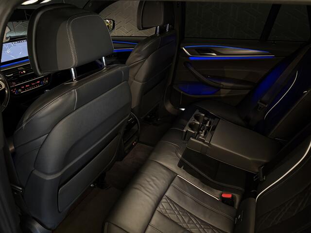 BMW 5-SERIE Touring 520i Business Ed | M-sport | Trekhaak | Tansanitblau