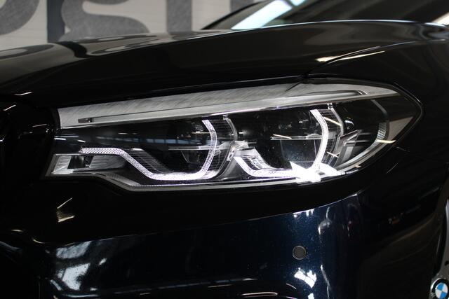 BMW 5-SERIE Touring 530i High Executive M-sport | Incl. 12 maanden garantie | 100% onderhouden | Memory-seats | Parkeercamera | Standkachel | Head-up display | Elektrisch uitklapbare trekhaak | Stoelverwarming | Climate control |