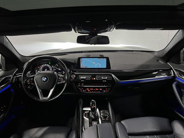BMW 5-SERIE Touring 520i High Executive Open dak | Adapt. cruise | 360 camera | Head-up | Stoelverwarming | Carplay