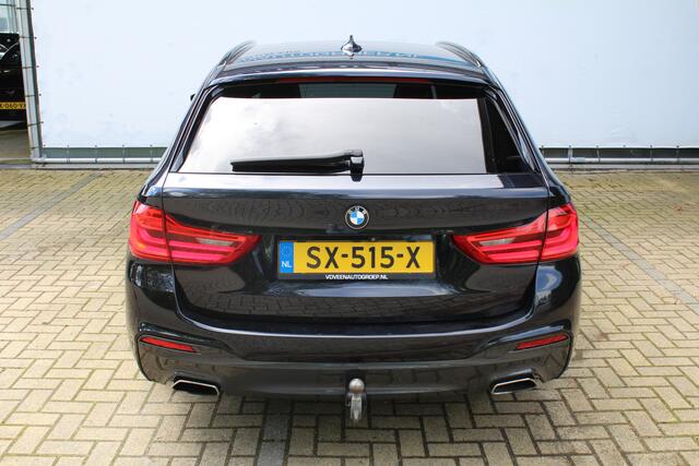 BMW 5-SERIE Touring 530i High Executive M-sport | Incl. 12 maanden garantie | Panoramadak | Dodehoek detectie | Geheugenstoelen | Parkeercamera | Standkachel | Head-up display | Elektrisch uitklapbare trekhaak | Stoelverwarming | Draadloze telefoonlader | Luxe leder