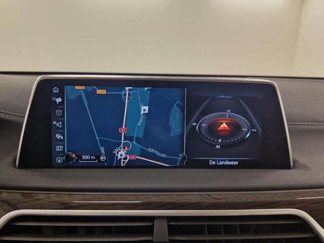 BMW 7-SERIE 740i High Executive | 56000km | Org NL | Schuifdak | Afn Trekhaak | Luchtvering | Volleder | HUD | Surround View | ParkAssist | Softclose | Achteras besturing | Etc...