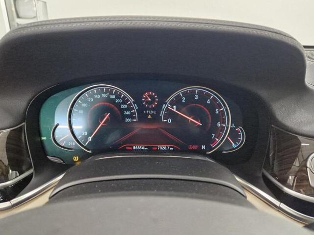 BMW 7-SERIE 740i High Executive | 56000km | Org NL | Schuifdak | Afn Trekhaak | Luchtvering | Volleder | HUD | Surround View | ParkAssist | Softclose | Achteras besturing | Etc...