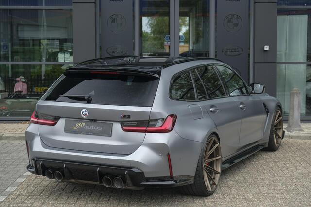 BMW M3 Touring Competition 510pk xDrive Widescreen Frozen grey *BTW* Head-up Adaptive cruise CSL grille 21" LMV
