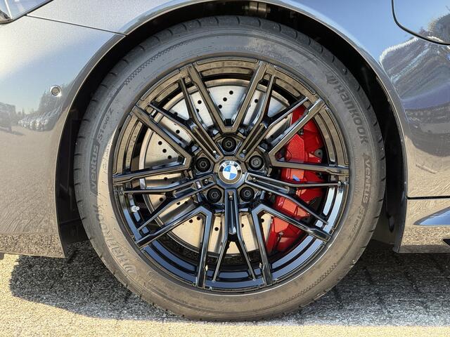 BMW M5 Touring | Panorama | Driving Ass. + | M Driver Pack | Trekhaak | Bowers & Wilkins | Iconic Glow | Carbon Interieurlijst