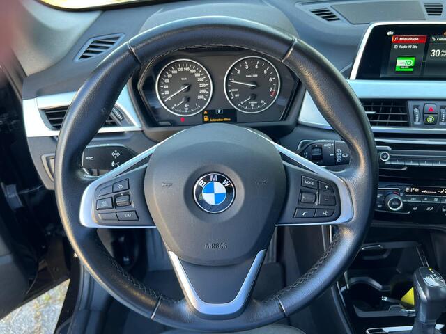 BMW X1 xDrive20i High Executive Sport-line AUT | LEER | 18'' | NAV | TREKHAAK