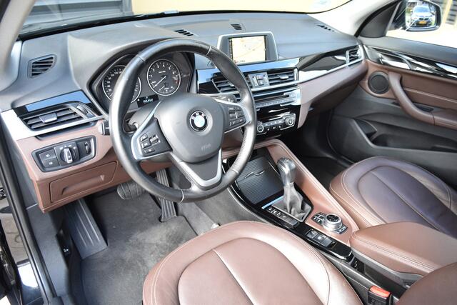 BMW X1 sDrive20i Centennial Executive * Camera * Leder * LED * Trekhaak *