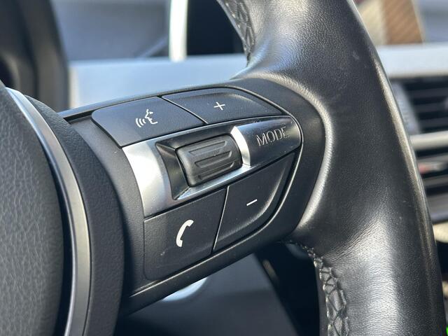 BMW X1 sDrive20i High Executive l Sfeer verlichting l Navi l Trekhaak l Electrische Klep