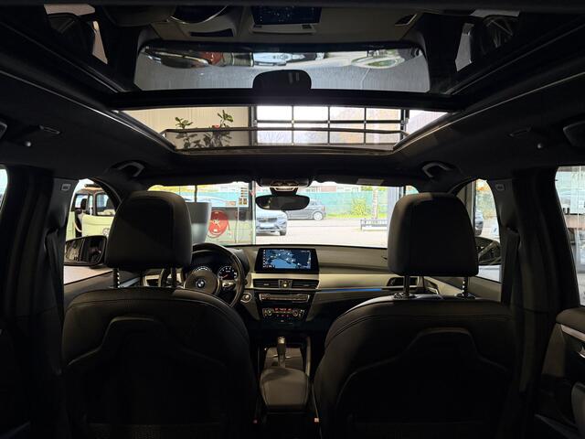 BMW X1 xDrive25e High Executive Sportline | Black edition | Panorama | HUD | Stoelverwarming